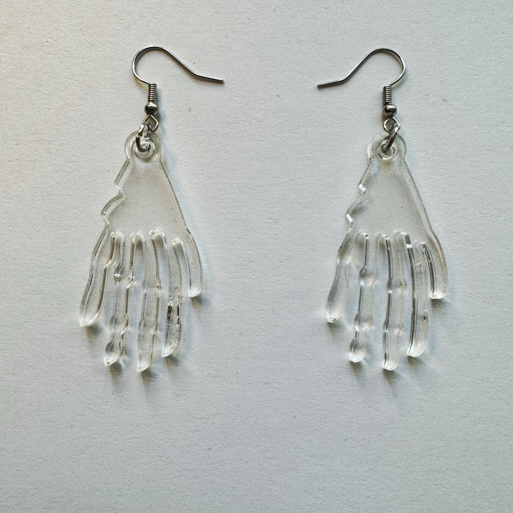 Clear resin skeleton hand earrings. Made to order